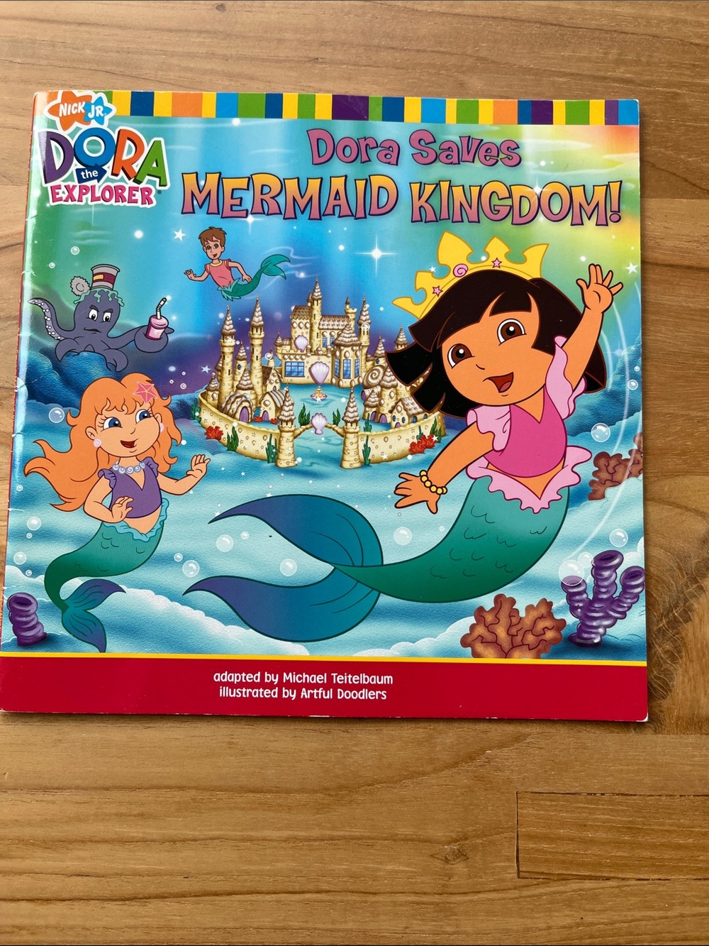 - Dora Saves Mermaid Kingdom! Paperback book